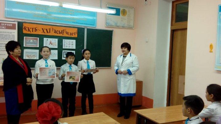 "ЖанайSecondary school  - бақша" КММ "ЖҚТБ -XXI ғасыр індеті"